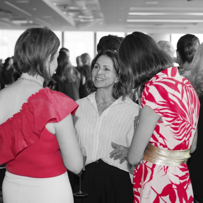 women talking together red colour treatment